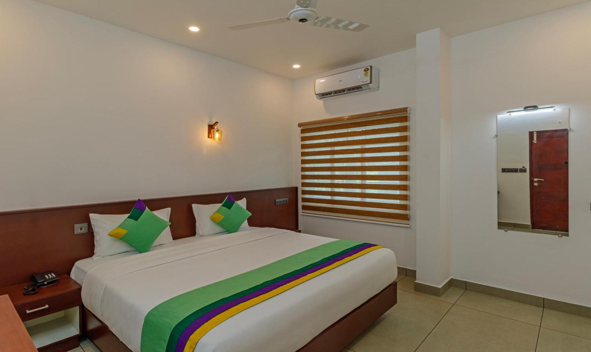 Treebo Amigos Residency Cochin Airport